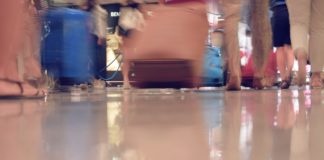 Think twice before touching the airport security trays tray