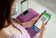 ASATA optimistic about digital health certificate announcement top-view-of-woman-holding-identification-documents-4NWHTHV