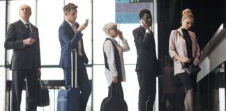 Business travel headwinds blowing in for European Summer 2024 business-people-at-the-airport-2023-11-27-04-57-58-utc