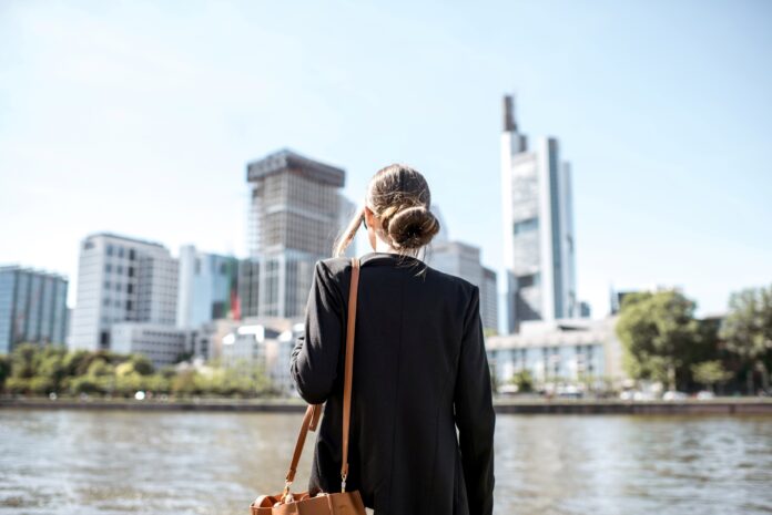 businesswoman-outdoors-in-the-modern-city-2023-11-27-04-53-45-utc businesswoman-outdoors-in-the-modern-city-2023-11-27-04-53-45-utc