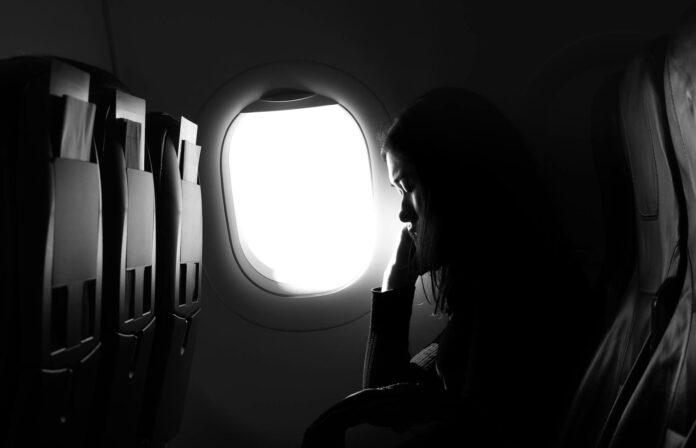 dark airplane seat window