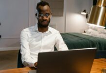 Post-crisis Middle East hotel rates present strategic procurement opportunity for SA corporates man on laptop